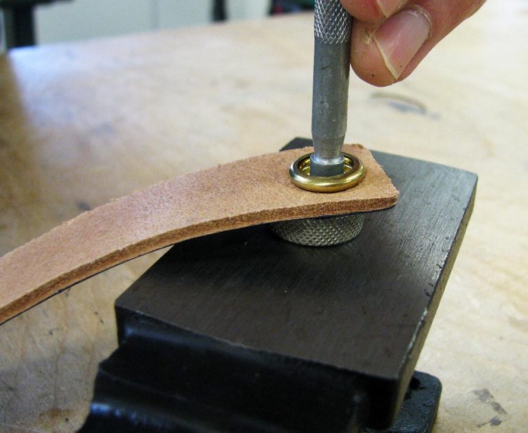Set the socket and cap snap against a concave anvil