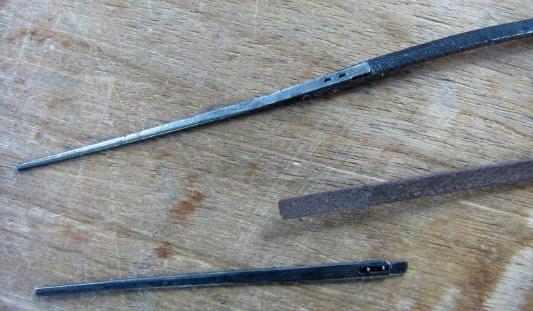Attach two-prong lacing needles